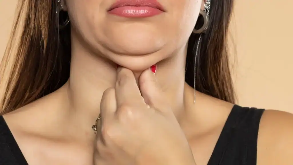 An image of a woman with double chin, sad, worried : Non Surgical Double Chin Removal Treatment in Uxbridge, UK